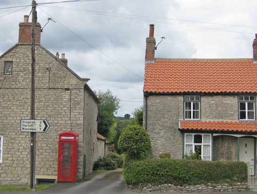 Houses and telephone box, Wrelton