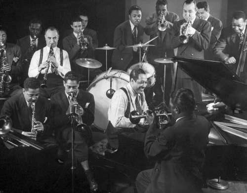 agelessphotography: Duke Ellington at the piano as Dizzy Gillespie (seated behind Ellington) and oth