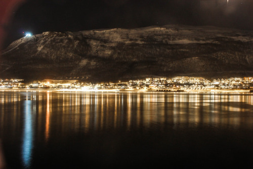 worldstreetjournal:Storsteinen - The Big Rock rising above the suburb of Tromsdalen with the Fjellhe