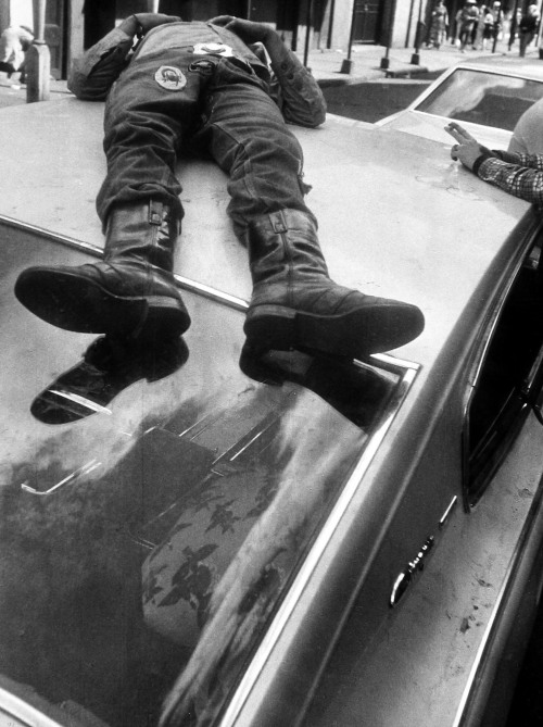 Leon Levinstein (American; 1910–1988)Man Lying on Roof of Car (French Quarter, New Orleans)1970sGela