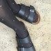 Polka dotted pantyhose with Birkenstock.