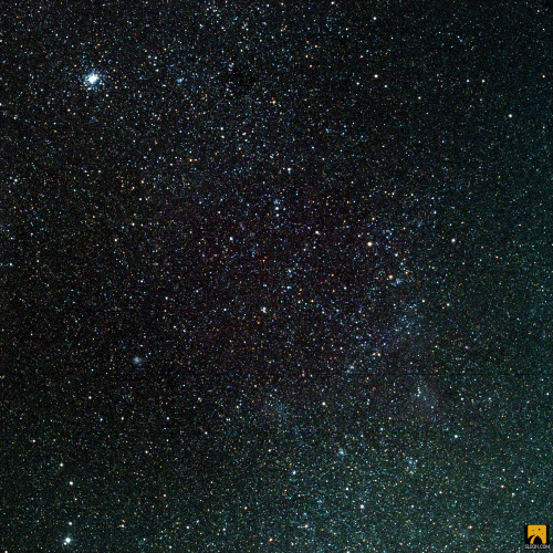 This is the Small Magellanic Cloud! The size and shape of this satellite galaxy makes it a dwarf and