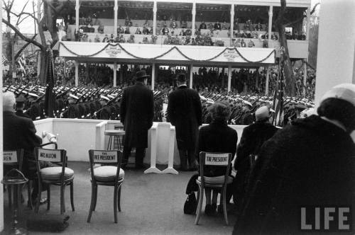 Nixon and Eisenhower on the Presidential reviewing stand(Hank Walker. 1957?)