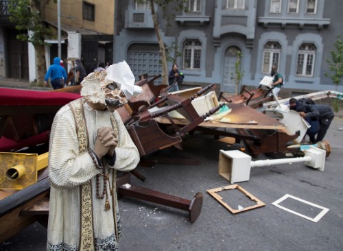 Anti-government demonstrations in Santiago turned violent, with rioters looting churches & destr