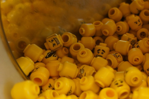 Yellow Lego heads from the lego shop in Copenhagen, Denmark.