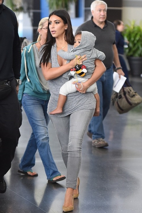 kimkanyekimye:  Kim and North arriving at JFK Airport in New York 8/11/14 