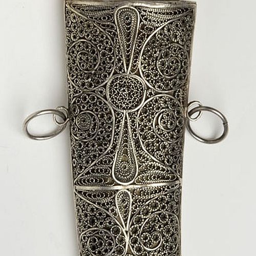 art-of-swords:  Khanjar Dagger Dated: 18th century Culture: Ottoman Place of Origin: Turkey Measurements: overall length 53 cm; blade length 30.5 cm The dagger has a curved blade of watered wootz steel and marine ivory handle. The scabbard is decorated