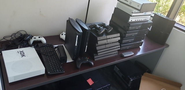Old dev kits stacked up on a desk