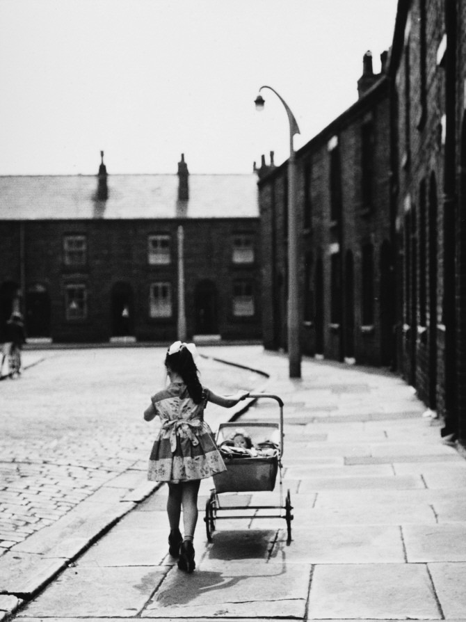 m3zzaluna:  a little girl in a pretty dress wearing high heels which are far too