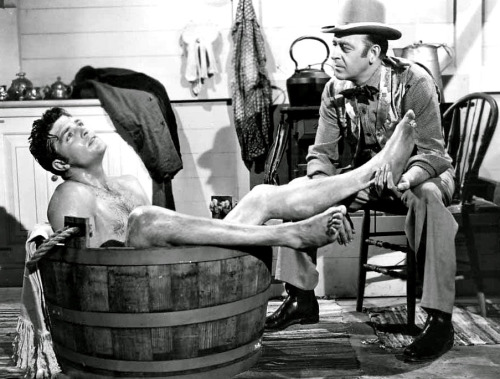 Dale Robertson bathing in a tub in The Farmer’s Wife,1953