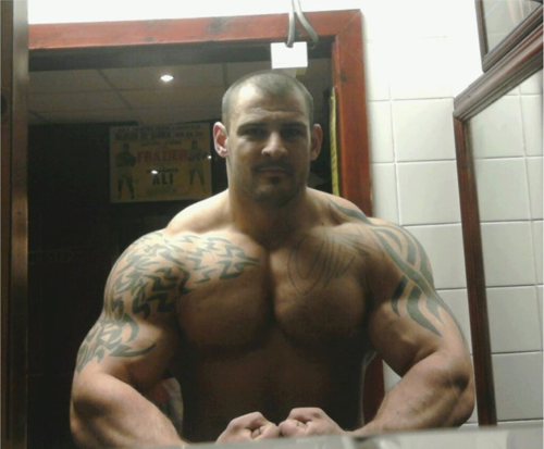 hotbodybuilders:  worshipalphamales:  bottombearcub:  I’ve seen this man’s pics floating around Tumblr, but I don’t know who he is. He’s quite a beautiful beast…send a link my way if you know who he is.  Seriously. Who is this Alpha of Alphas,