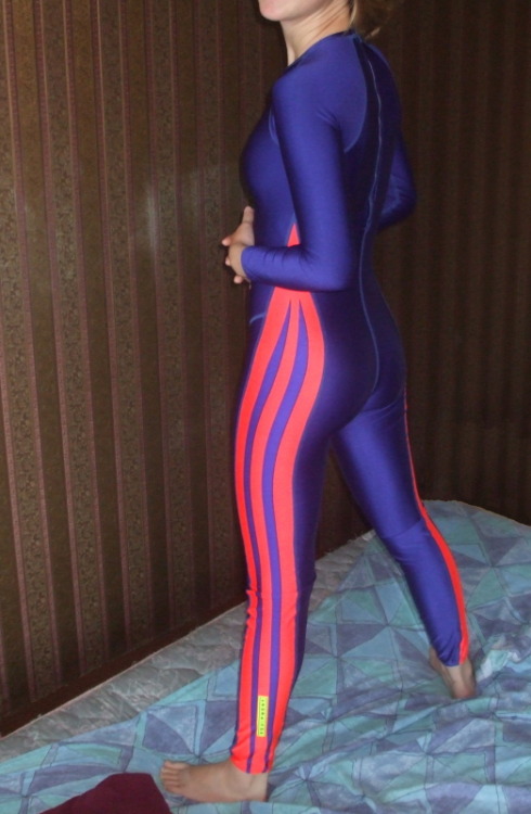 adidas-equipment:Girl trying out her blue with red stripes Adidas Equipment suit. One size smaller, 