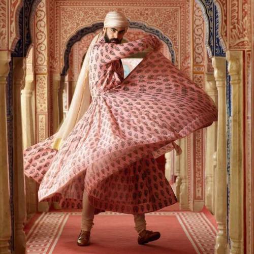 The Call of the Peacock A flamboyant men’s printed cotton angrakha in kanauj-pink coromandel chintz.