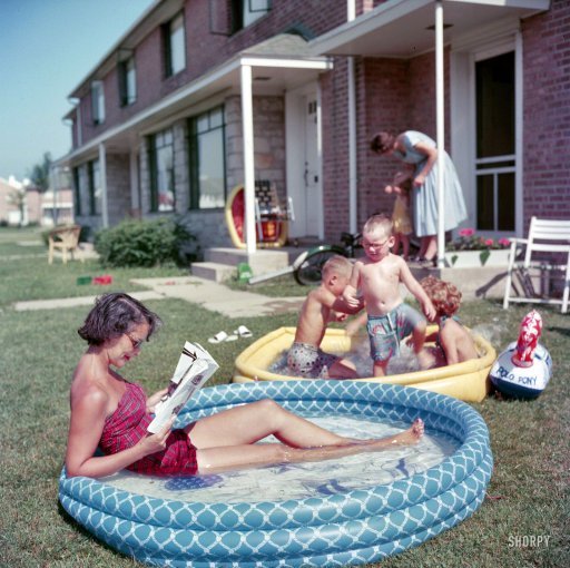 theniftyfifties:  A pool party in Park Forest, Illinois, 1954. 