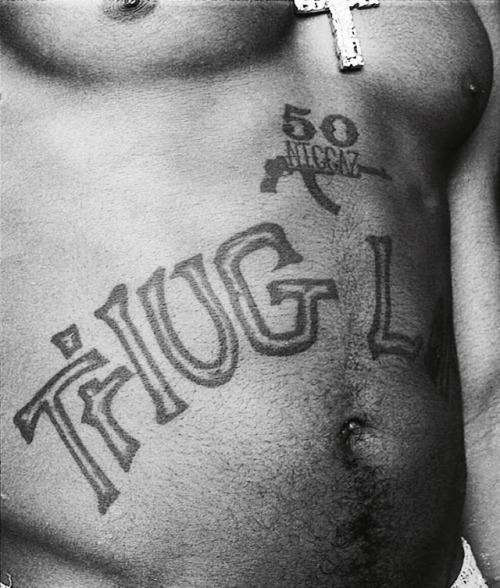Why did Tupacs Queen Nefertiti tattoo get scarred up  rTupac