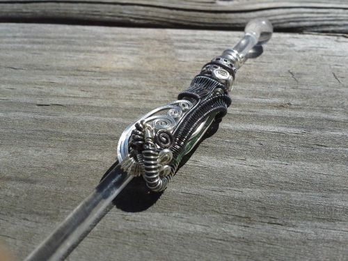 Check out this dabber that I made as part of a series! All sterling silver, featuring a green tourma