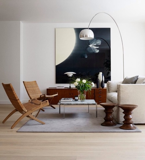 folding chairs by Hans J. Wegner , Poul Kjaerholm table with marble top, Poul Henningsen table lamp 
