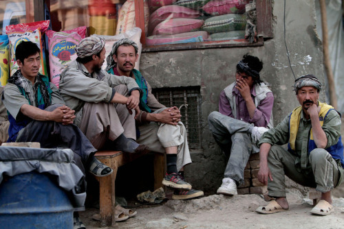 Hazara labourers wait for customers at a market in Kabul, Afghanistan on Sept. 23, 2013. [Credit :&n