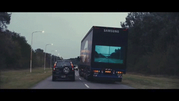 zooophagous:  mashable:  strategystream:  mashable:  Samsung is solving real problems. They have created the Safety Truck, a semi truck with a wireless camera mounted on the front, displaying the road ahead on a screen tacked on to the back of the truck.