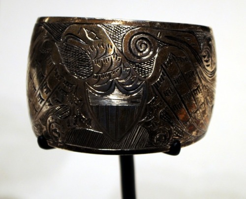 Silver bracelet with an American Eagle design, made by the Haida people of the Pacific Northwest.  A
