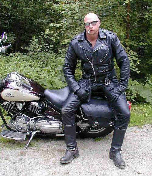 cigarjon:  cigartop:  Buck.  Sexy biker.