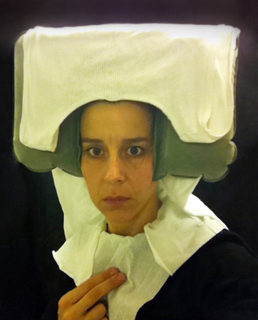 anticonfluentialist-deactivated:  While in the lavatory on a domestic flight in March 2010, I spontaneously put a tissue paper toilet cover seat cover over my head and took a picture in the mirror using my cellphone. The image evoked 15th-century Flemish