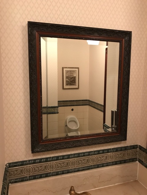 Single urinal at the posh Walt’s restaurant at Disneyland Paris.