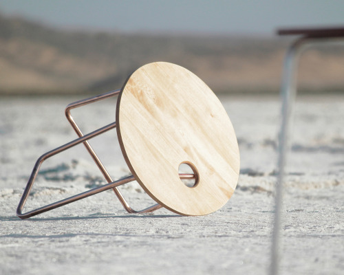 www.andrewsimeoni.com The 20 stools are constructed with two simple elements, a wooden top and a sin