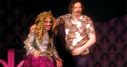 [Image description: Mighty Boosh live show - the curtains open to reveal Julian and Noel snogging. T