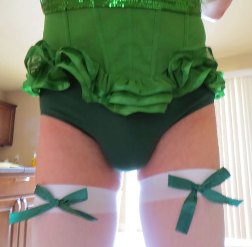 yoursissyfag:  sissyslut faggot mincing about wearing her pretty green bustier brief panties thigh high stockings and cum fuck me strappy high heels 