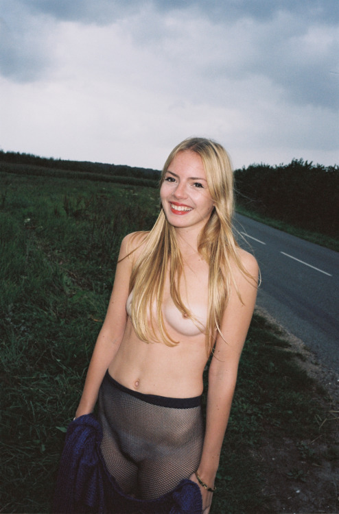 americanapparel: Mathilde in the Mohair Cardigan and Fishnet Hosiery.