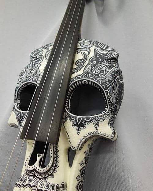 theonlymagicleftisart - Skull violins by Jeff Stratton.  h/t...
