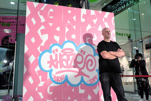 NYC graffiti artist Eric Haze live painting in front of LaForet Harajuku today for X-Girl&rsquo;s 20