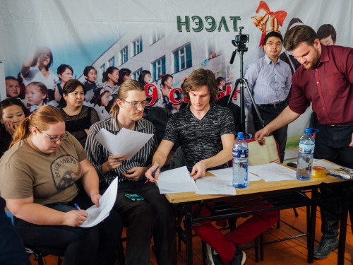 The industrious crew of Peace Corps Volunteer judges.