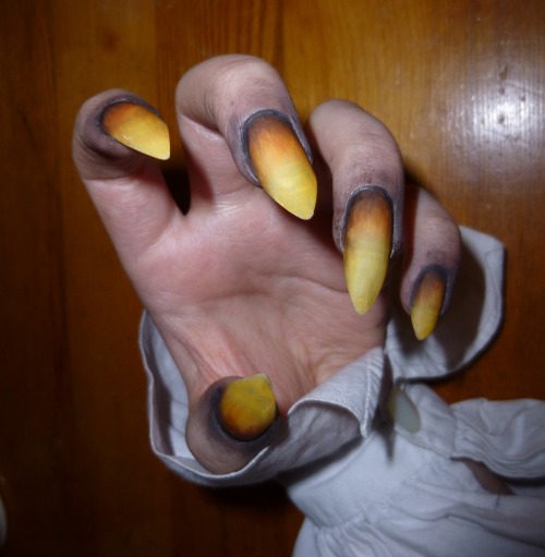 I just found out that you can use acrylic paint to make your nails look like gross claws! You put on