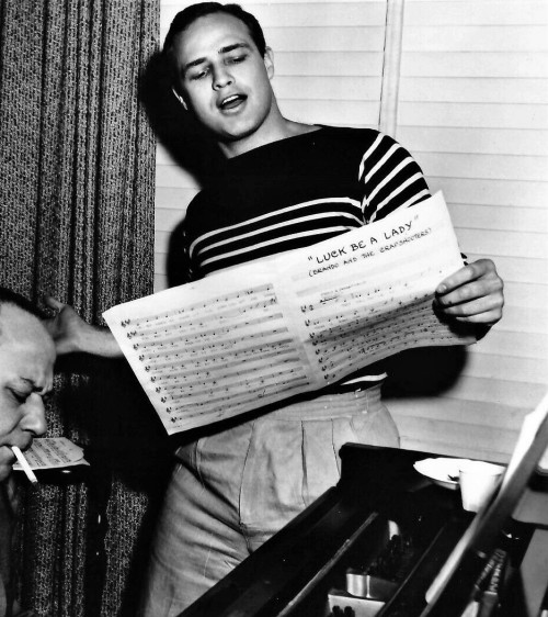 olivethomas:  Marlon Brando rehearsing a song for Guys and Dolls, 1955