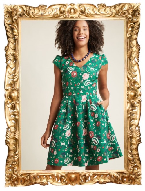 You Can Fete On It A-Line Dress in Green Garden - $129.99Complete the holiday look with red accents 