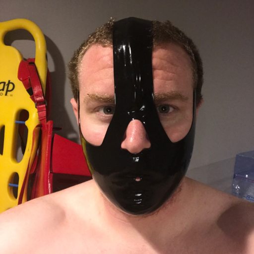 gearmedic: Under the muzzle was a 2 inch ball gag. And he whispered in my ear, “2 more hours, gimp.”  
