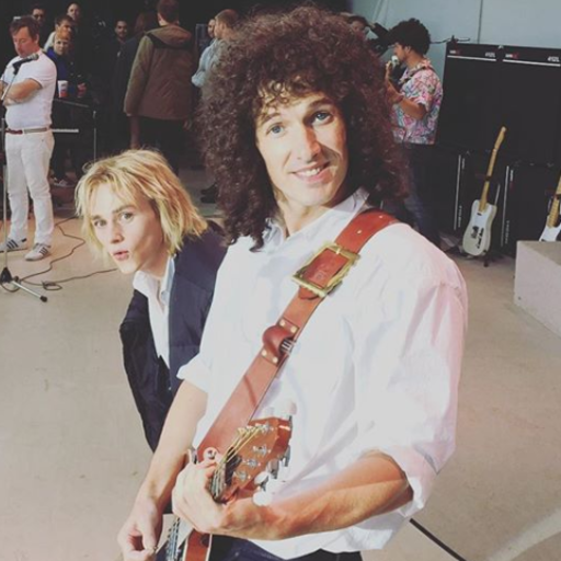 taylormaydwithlove:  ben hardy as roger taylor pouring beer on his drums before playing them, spraying beer all over himself while wearing only a vest was my sexual awakening 