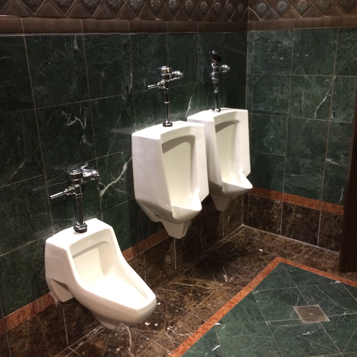 Strokin and chubbin at the urinal. 