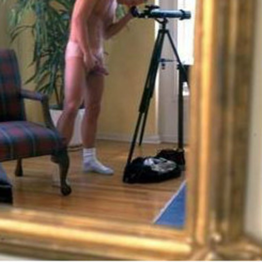 nakedonthebalcony: I think this is one of the most beautiful men I’ve ever filmed, except maybe my husband. His dick was always hard and he was alway naked. (3) I never know who enjoys this more, the exhibitionist or the voyeur. 