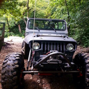 Awesome jeep, awesome obstacle climb. But he&rsquo;s listening to one of the WORST bands in the world!