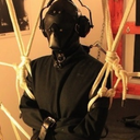 feelingknottycda:The gimp’s revenge. A mix of tit torture and a weighted boot swinging from my balls while well-secured in a straightjacket, hooded and gagged, with white noise.  As you can tell from my cock, I hated every moment. ;)
