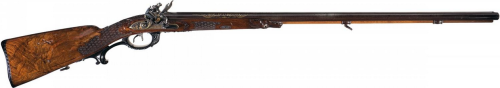 Magnificent 18th century German double barrel flintlock rifle with carved stock and gold inlaid barr