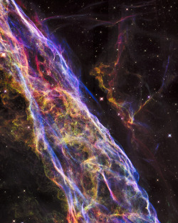 ohstarstuff: Veil Nebula Supernova Remnant  via NASAHubble Space Telescope has unveiled in stunning detail a small section of the expanding remains of a massive star that exploded about 8,000 years ago. Called the Veil Nebula, the debris is one of the