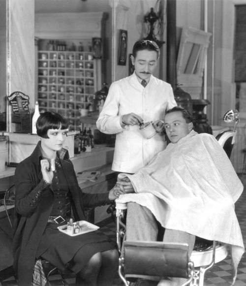 whataboutbobbed:Louise Brooks offers barbery support in 1926’s A Social Celebrity [this f