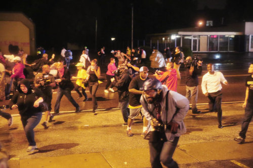 weather-underground:  anarcho-queer:  Captain Johnson Breaks Promise, Uses Tear Gas And Military Vehicles Against Ferguson Protesters August 17th, 2014 Captain Johnson broke a direct promise he made on Saturday when officers and SWAT under his control