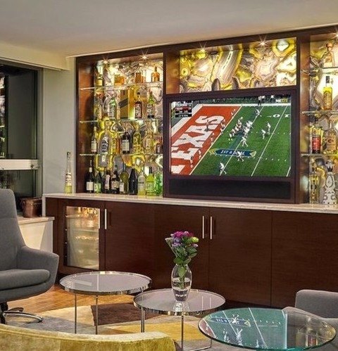 U-Shape Home BarImage Of A Mid-sized Modern U-shaped Home Bar With A Seated Patron, A Dark Wood Floor,