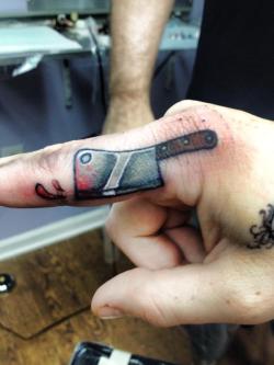 fuckyeahtattoos:  Fun little meat cleaver on a chef who recently opened his own business.Tattoo by Rob Zeinog of Evolved Body Arts in Edgewood, MD.facebook.com/evolvedbodyarts 