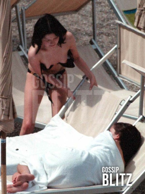 toplessbeachcelebs:  Andrea Corr (Singer) sunbathing topless in Taormina, Italy (April 2001) 